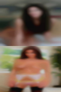 An older swingers club couples adult Hispanic couple.